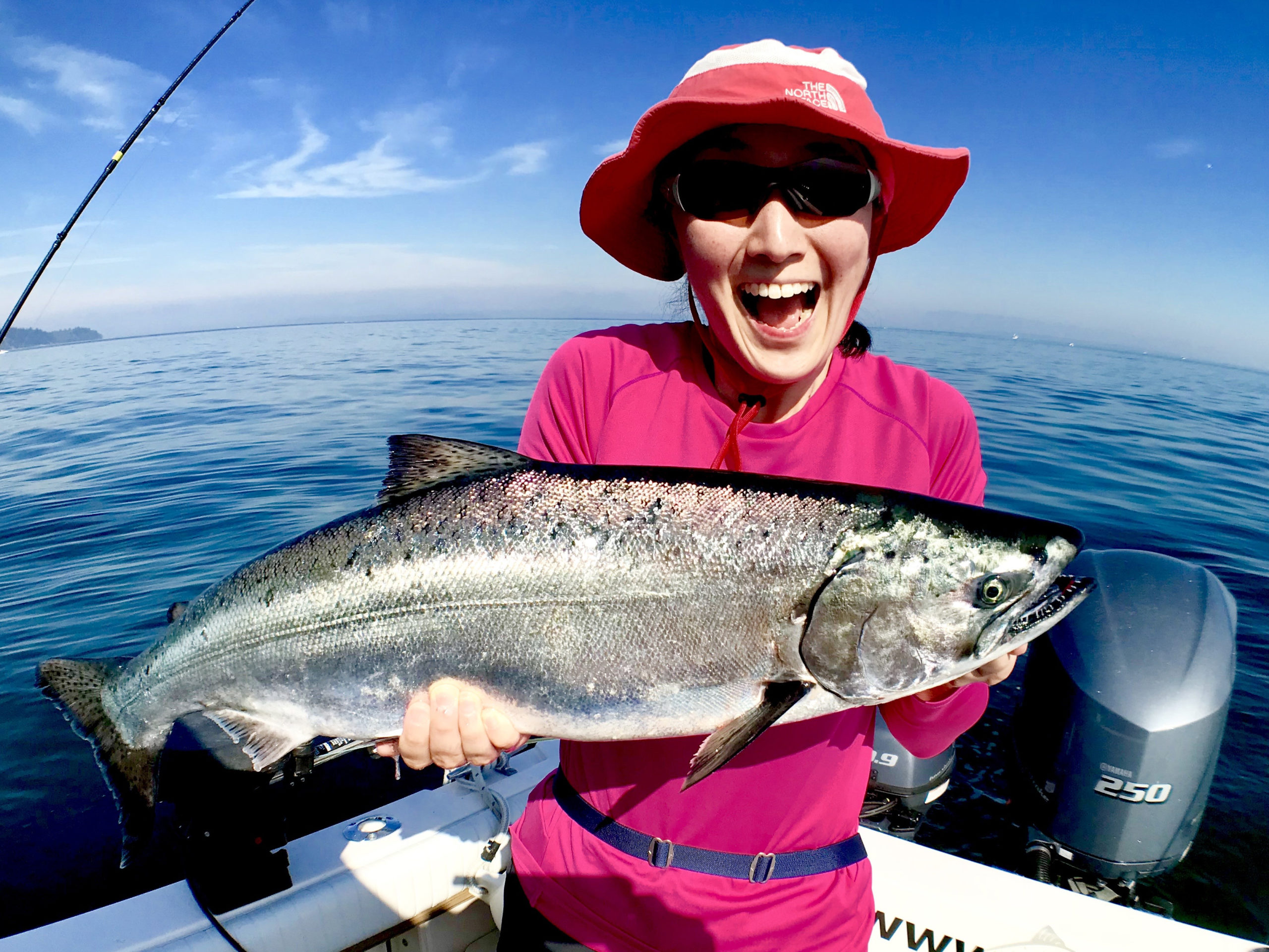 Sport Salmon Fishing Charters. Happy lady.